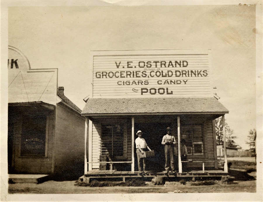 V. E. Ostrand Groceries - Southwest corner of Main Street and 1st Street, c.1910